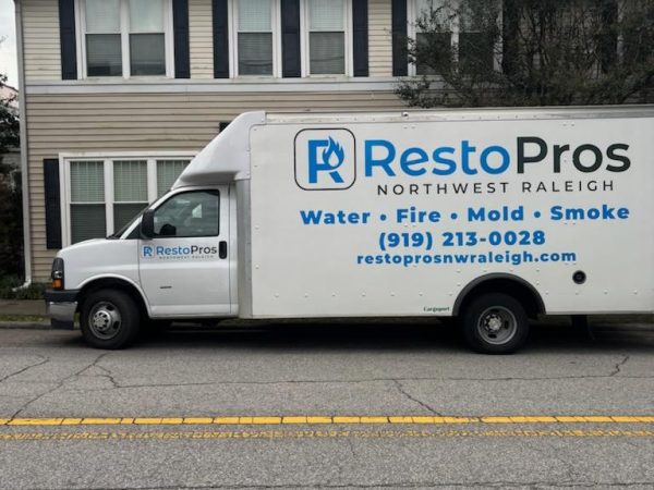 RestoPros of Raleigh's service van providing water damage restoration Raleigh